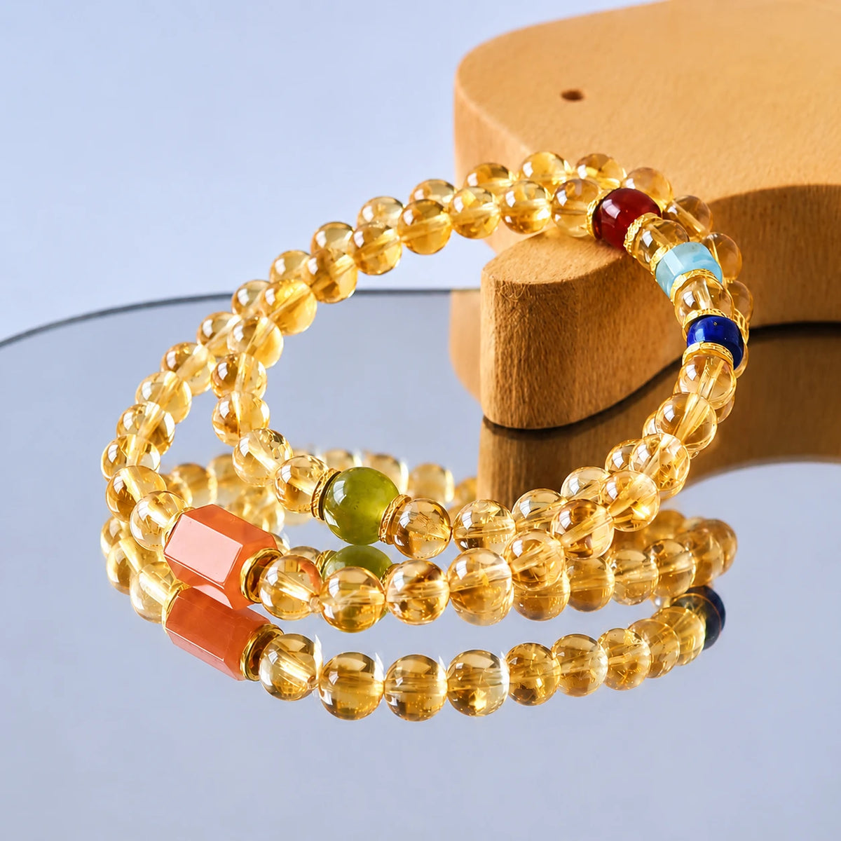 Translucent Golden Citrine Crystals Displayed Under Soft Natural Sunlight Shadows