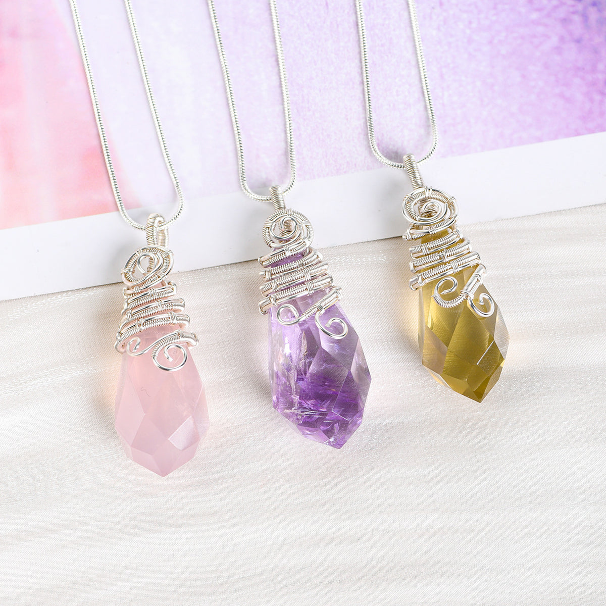 Citrine faceted crystal drop pendant with layered handmade wire wrapping and silver-tone chain
