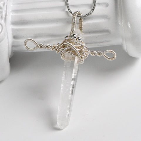Clear Quartz wire-wrapped sword and cross pendant necklace with silver-tone detailing