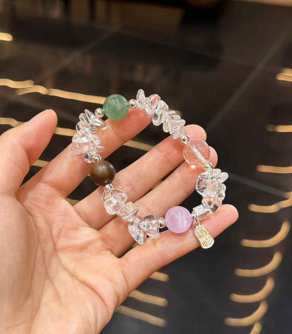 Clear Quartz chip bracelet with Green Strawberry Quartz focal bead, Kunzite and dark Agarwood accent