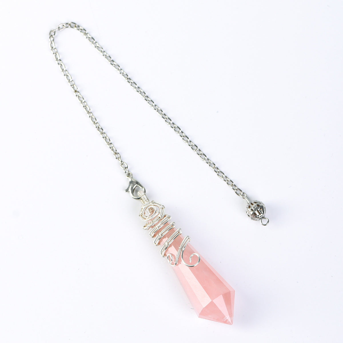Multiple natural crystal pendulum variants in different tones with matching silver-tone wire-wrapped designs