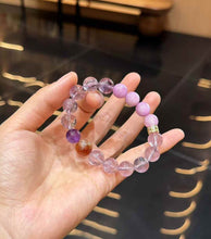 Full view of the crystal bracelet showing Bolivian Amethyst, Kunzite and Yellow Tower Quartz accent details