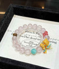 Veridia Rose Quartz bead bracelet with Bodhi butterfly accent, wooden bear charm and colorful decorative beads