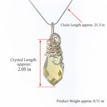 Smoky Quartz pendant with close-up handmade spiral wire wrapping and geometric faceted stone