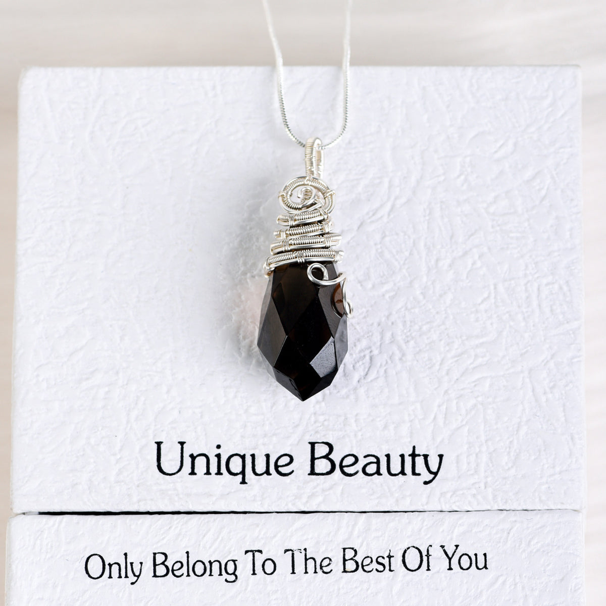 Wire-wrapped crystal necklace size guide showing approx. 21.26 in chain, 2.05 in crystal length and 0.71 oz weight
