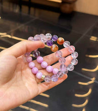 Close-up detail of the bracelet highlighting the Yellow Tower Quartz accent and mixed crystal arrangement