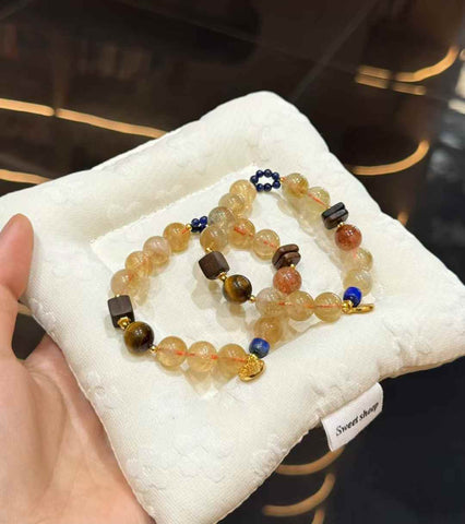 Veridia Yellow Tower Quartz bracelet with Black Gold Super Seven, Tiger Eye, Lapis Lazuli, Agarwood and copper charm accents