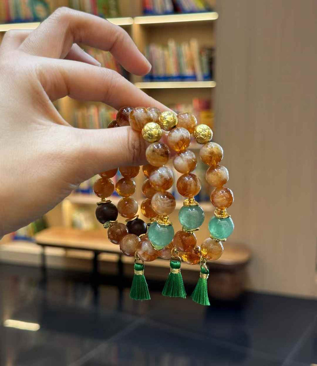 Coordinated Yellow Tower Crystal tassel bracelets with Agarwood and green gemstone focal accents