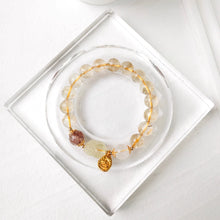Antique Inspired Polished Gold Tone Drop Charm with Traditional Character Embossing