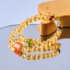 Citrine Double Wrap Bracelet Mirror Display Citrine double wrap bracelet with Xiuyan jade and colorful gemstone accents displayed on a mirror