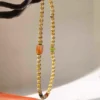citrine-double-wrap-bracelet-hanging-display Natural Citrine Wrap Bracelet with Jade Aquamarine Lapis and Red Agate Accents