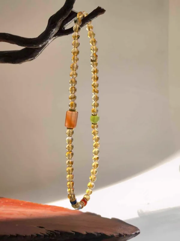 citrine-double-wrap-bracelet-hanging-display Natural Citrine Wrap Bracelet with Jade Aquamarine Lapis and Red Agate Accents