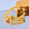 citrine-double-wrap-bracelet-multi-gemstone Translucent Golden Citrine Crystals Displayed Under Soft Natural Sunlight Shadows