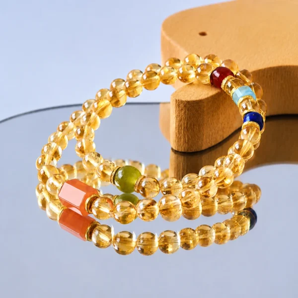 citrine-double-wrap-bracelet-multi-gemstone Translucent Golden Citrine Crystals Displayed Under Soft Natural Sunlight Shadows
