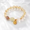 Reddish Brown Black Gold Super Seven and Clear Quartz Accent Beads Detail